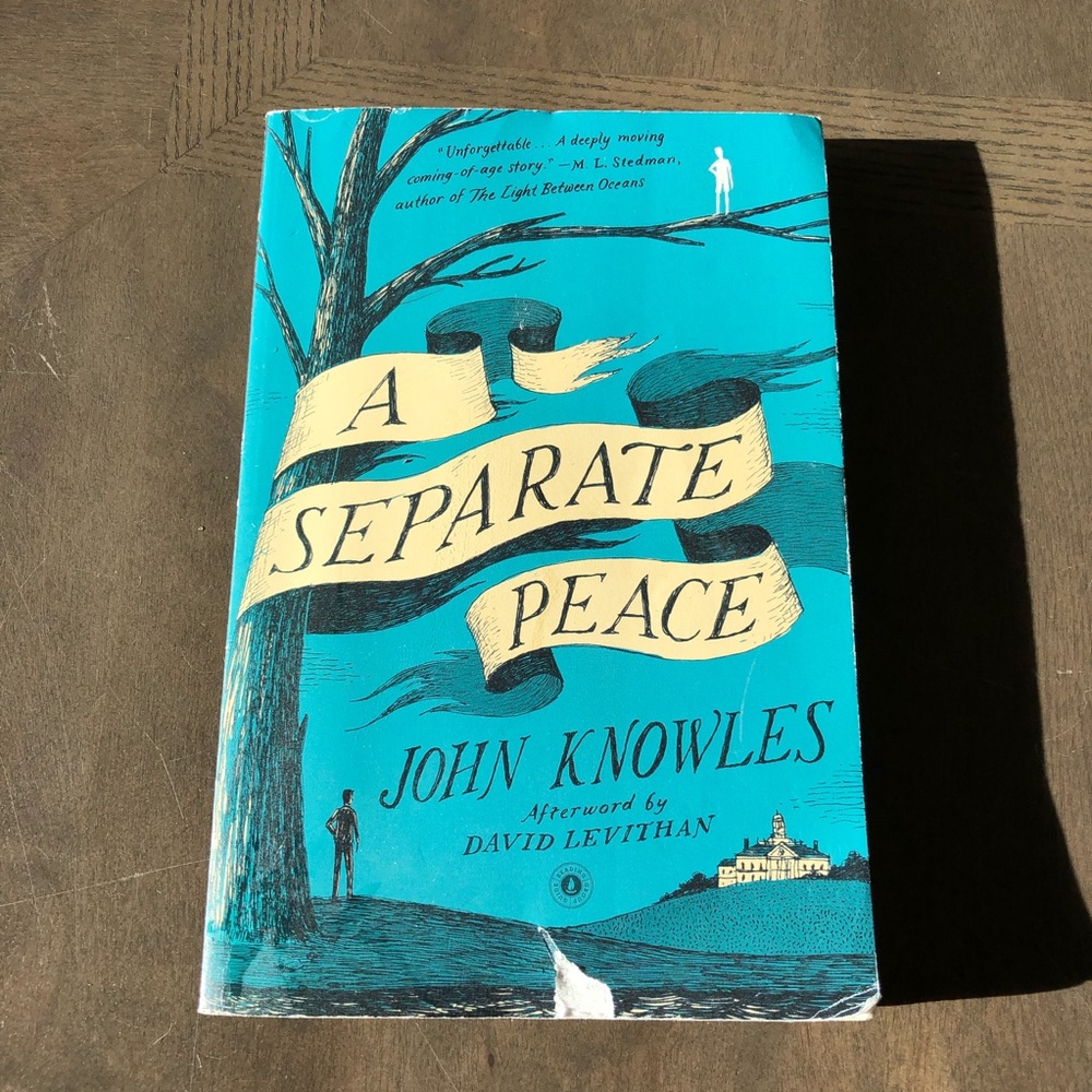 Paperback copy of a separate piece by john knowles